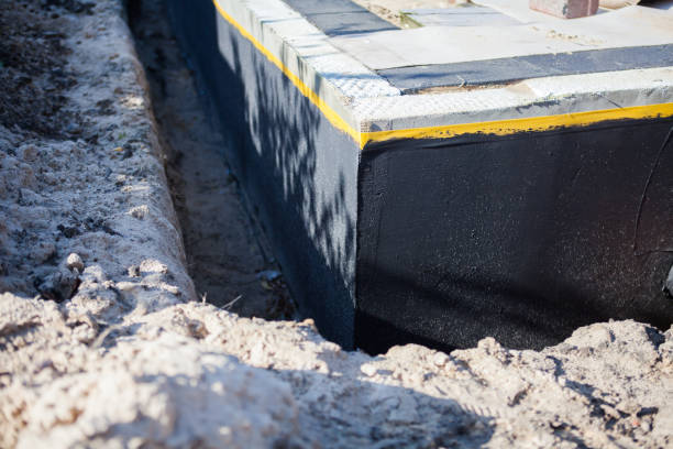 Professional Exterior Waterproofing technician working in Greenville, VA